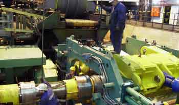 downcoiler for rolling mills
